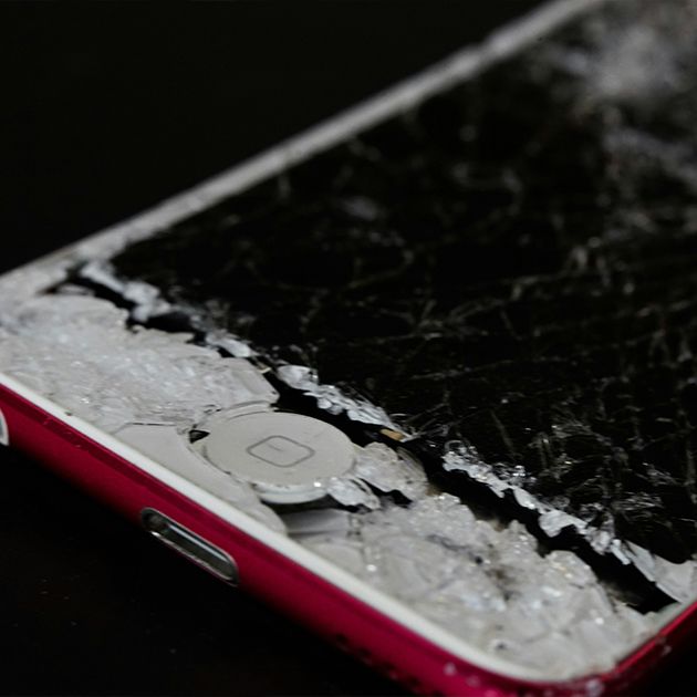 Phone with a crack screen.